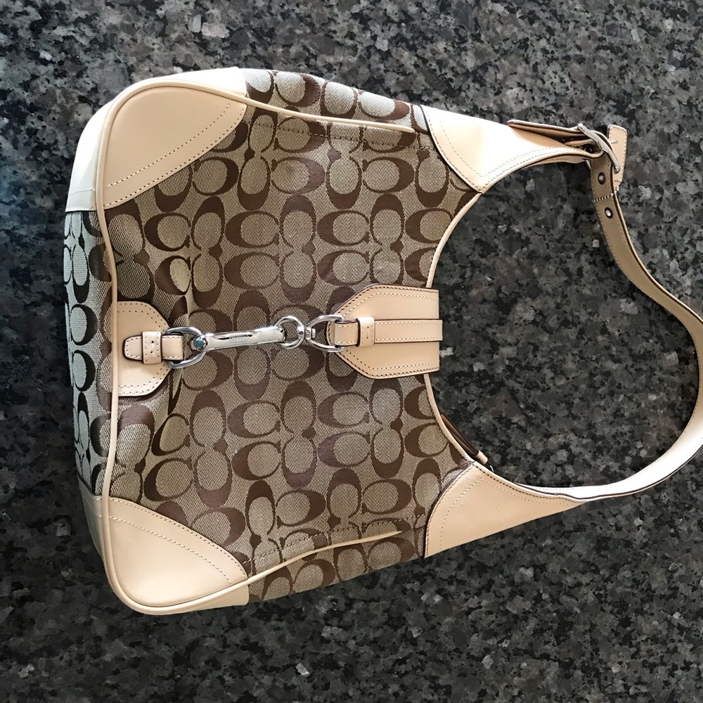 Tan and brown coach purse - never been used